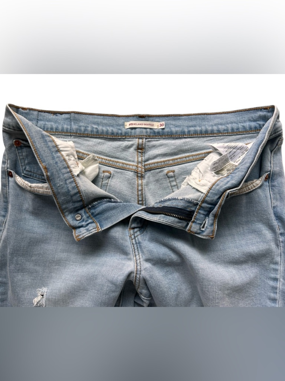 Levi’s Women’s 415 Relaxed Bootcut Distressed Denim Jeans - Picture 5 of 13